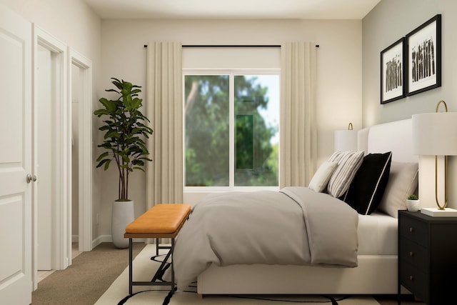 carpeted bedroom with baseboards