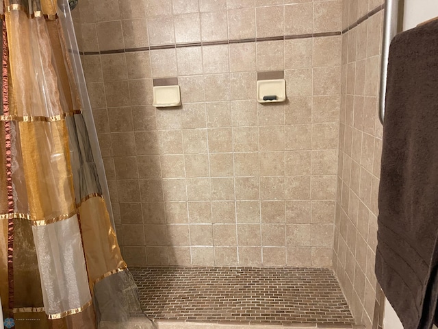 bathroom featuring a stall shower