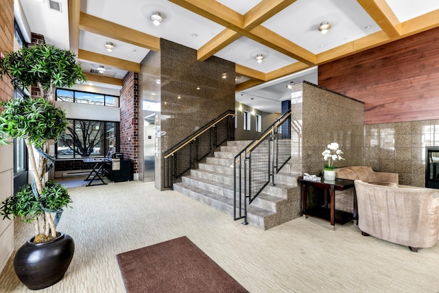 community lobby with stairs and visible vents