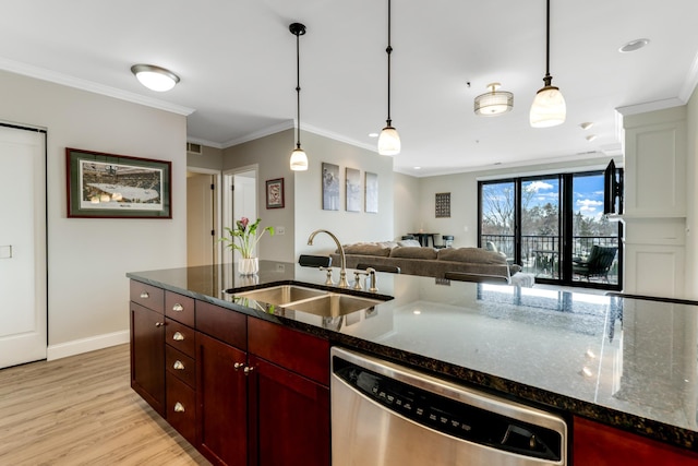 kitchen with ornamental molding, a sink, light wood-style floors, stainless steel dishwasher, and decorative light fixtures