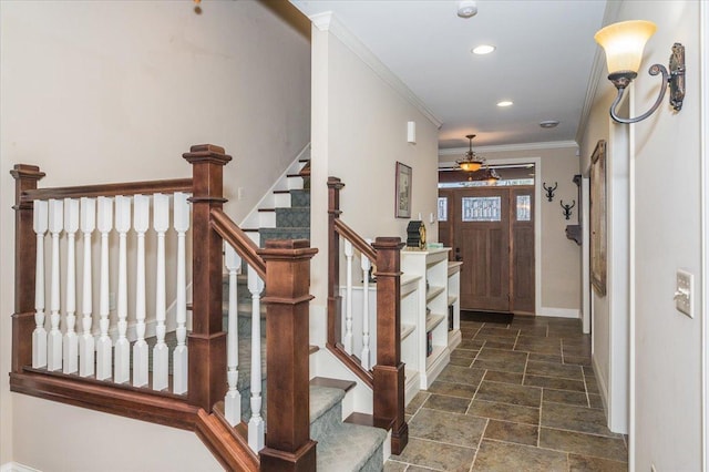 foyer entrance with baseboards, stairway, stone finish flooring, crown molding, and recessed lighting