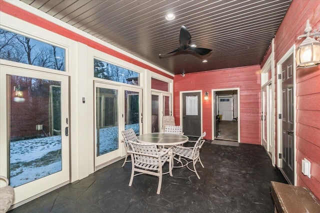 sunroom with wood ceiling, french doors, and ceiling fan