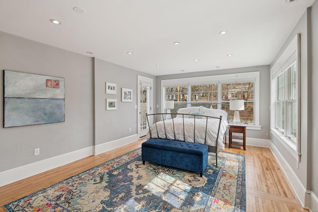 bedroom featuring recessed lighting, baseboards, and wood finished floors