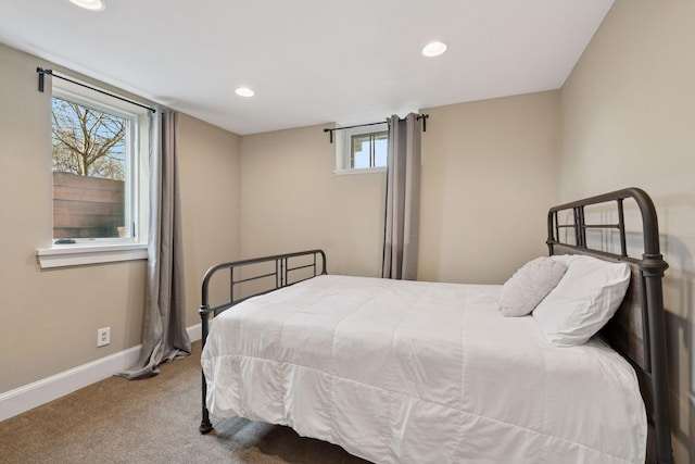 bedroom featuring recessed lighting, baseboards, and carpet flooring