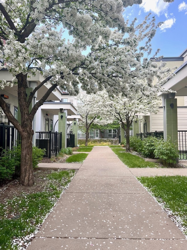 view of property's community with fence