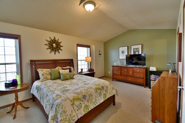 bedroom featuring baseboards, lofted ceiling, light colored carpet, and a textured ceiling