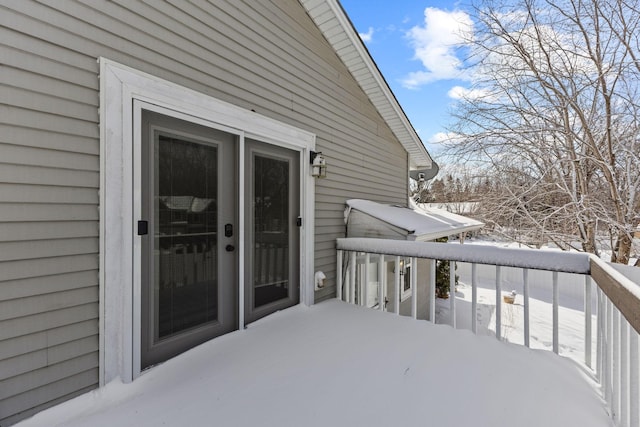 view of snow covered deck