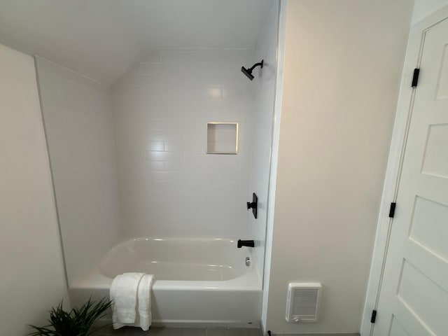 bathroom featuring shower / tub combination and visible vents