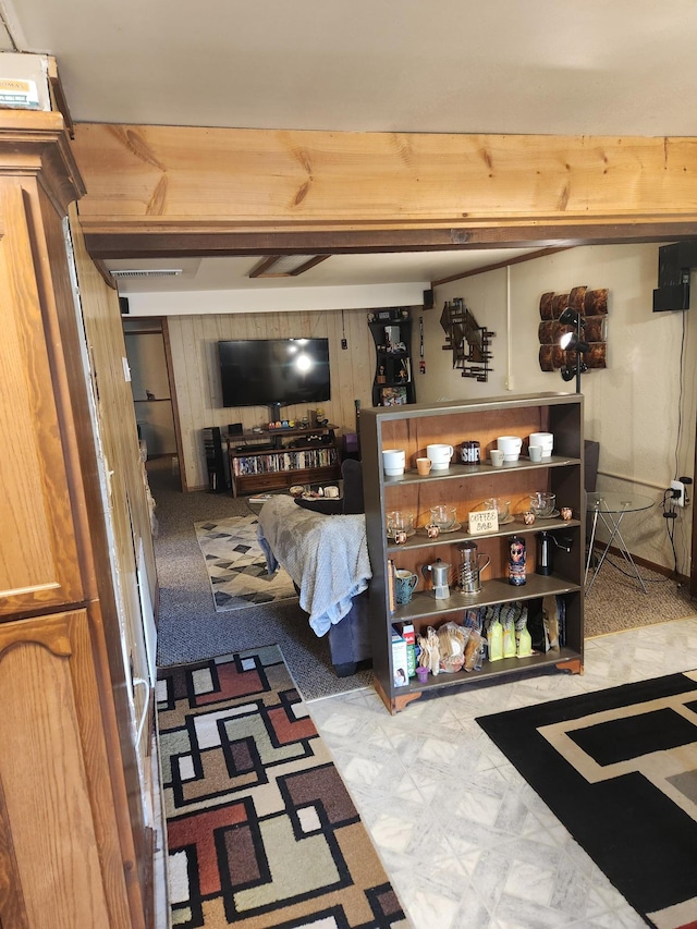 finished basement featuring tile patterned floors