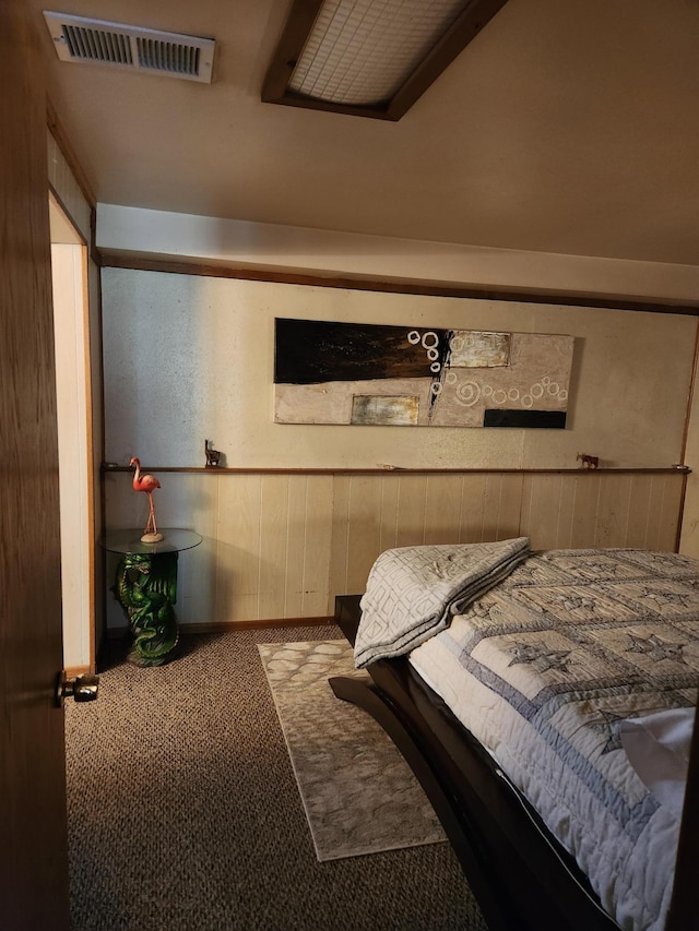 carpeted bedroom with visible vents