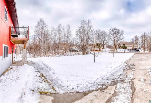 view of snowy yard