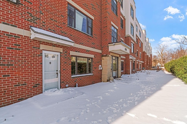 view of snow covered property