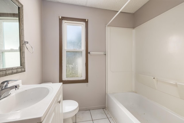 full bath featuring baseboards, toilet, tile patterned flooring, vanity, and shower / washtub combination