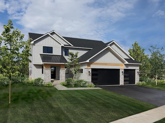 view of front facade with a garage, stone siding, driveway, a front lawn, and board and batten siding