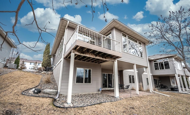 rear view of property with a patio area