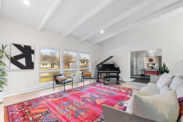 living area with vaulted ceiling with beams, baseboards, baseboard heating, and wood finished floors