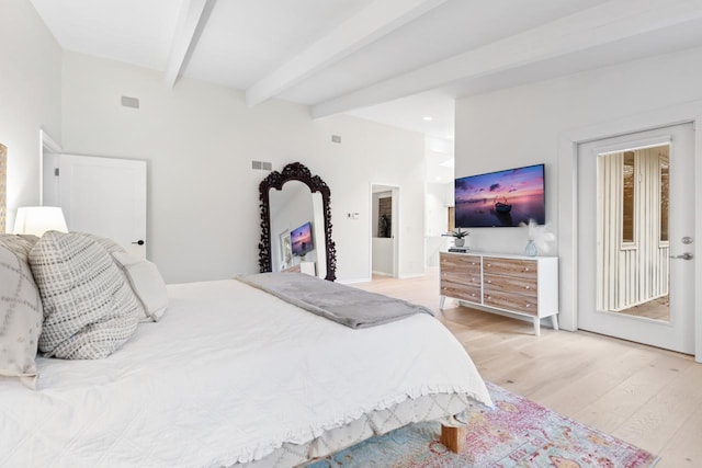 bedroom with access to exterior, lofted ceiling with beams, visible vents, and light wood-style floors