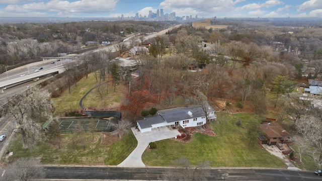 birds eye view of property featuring a city view