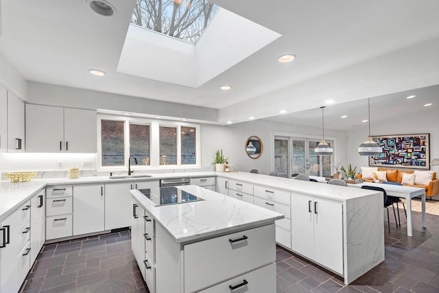 1345 Fairlawn Way, Golden Valley, MN 55416 - kitchen with a sink, a kitchen island, black electric cooktop, a peninsula, and recessed lighting