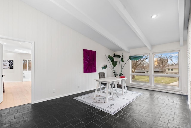 1345 Fairlawn Way, Golden Valley, MN 55416 - dining room with stone tile flooring, beamed ceiling, baseboards, and wooden walls