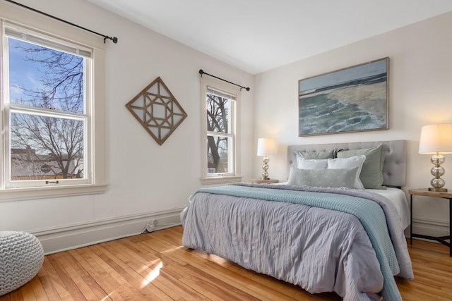 bedroom featuring wood-type flooring