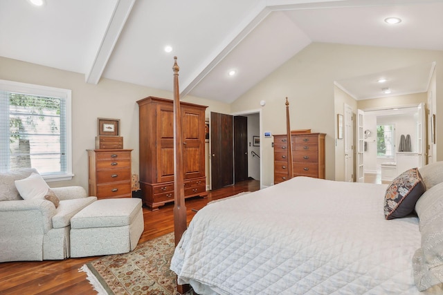 bedroom featuring lofted ceiling with beams, wood finished floors, and recessed lighting