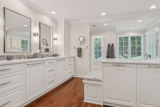 full bath with recessed lighting, vanity, crown molding, and wood finished floors