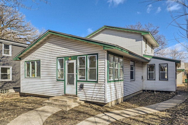 split level home featuring entry steps