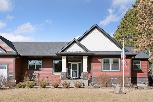 craftsman-style house with a shingled roof