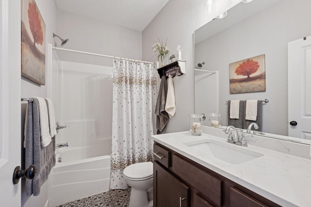 full bathroom with toilet, vanity, and shower / tub combo