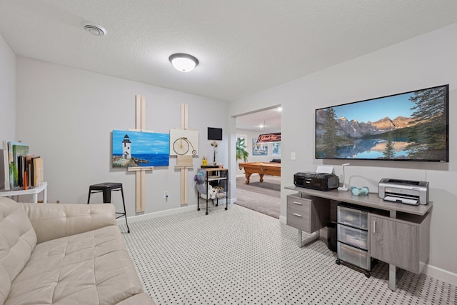 office area featuring visible vents, pool table, baseboards, light colored carpet, and a textured ceiling