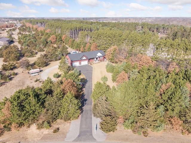 aerial view featuring a view of trees