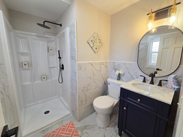 full bath with toilet, marble finish floor, vanity, a walk in shower, and tile walls