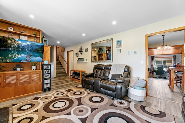 1422 24th Ave S, Moorhead, MN 56560 - living room with light wood-style floors, stairs, recessed lighting, and a chandelier