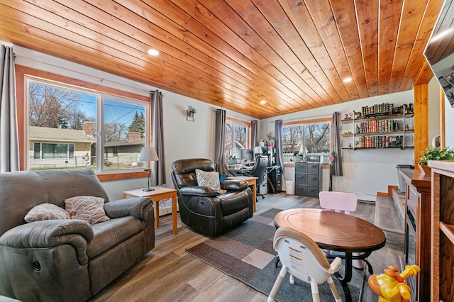 1422 24th Ave S, Moorhead, MN 56560 - living room featuring wood finished floors, wooden ceiling, vaulted ceiling, recessed lighting, and a baseboard heating unit