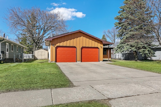 1422 24th Ave S, Moorhead, MN 56560 - view of front facade with a shed, board and batten siding, and a garage
