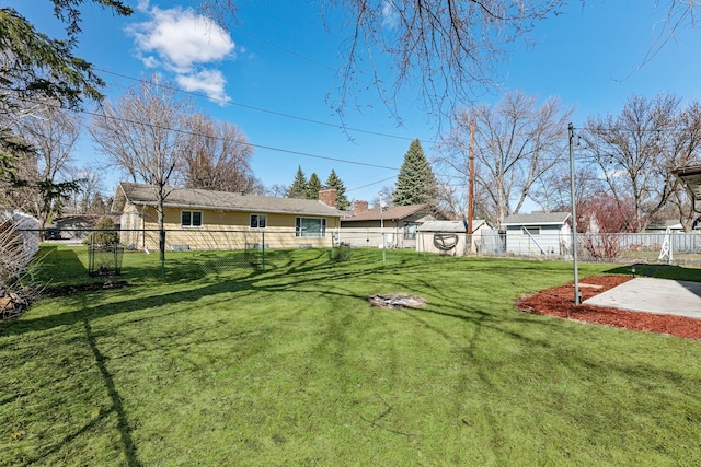 1422 24th Ave S, Moorhead, MN 56560 - fenced backyard with a patio area
