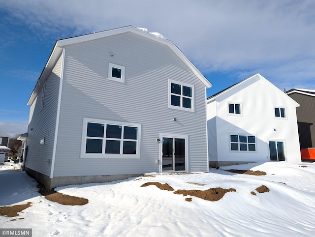 view of snow covered property