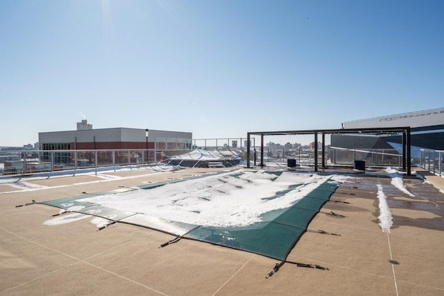 view of pool with fence