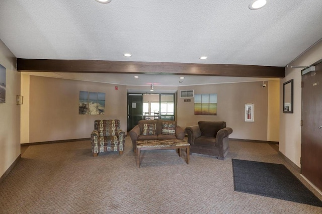 carpeted living area with beamed ceiling, a textured ceiling, and baseboards