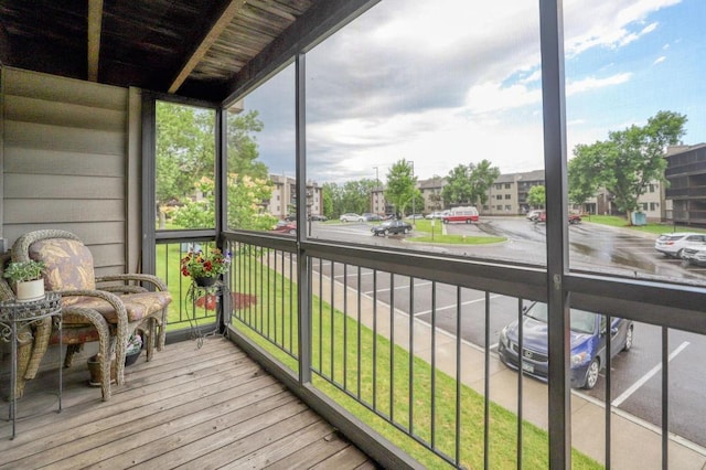 sunroom / solarium with a residential view