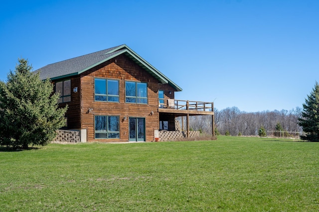 back of house with a yard and a wooden deck