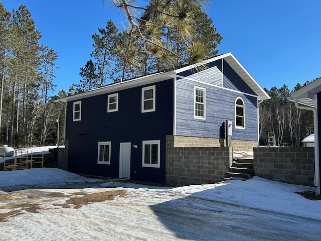 view of snow covered property