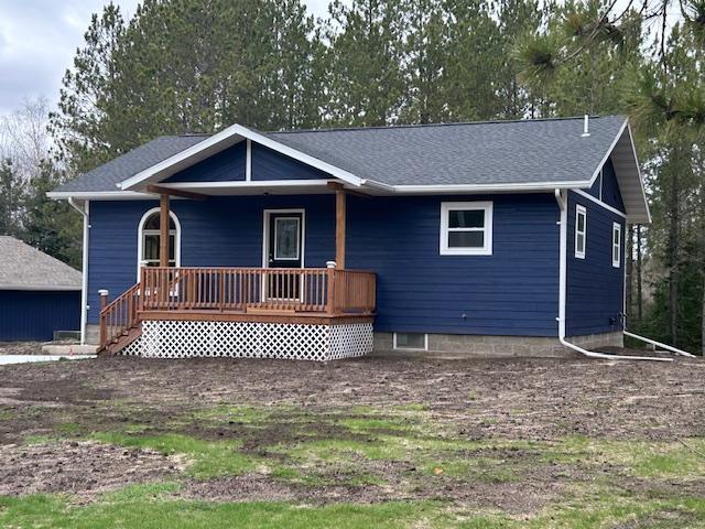 31154 Arbo Rd, Arbo Twp, MN 55744 - single story home featuring a porch