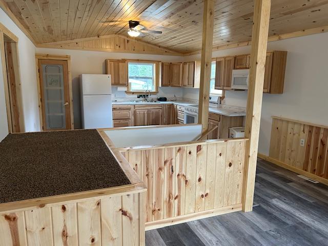 31154 Arbo Rd, Arbo Twp, MN 55744 - kitchen with light brown cabinets, white appliances, wooden ceiling, lofted ceiling, and dark wood-style floors
