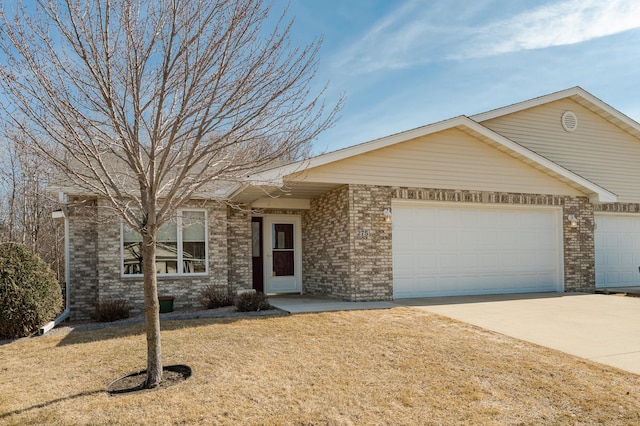 single story home featuring a garage, brick siding, concrete driveway, and a front lawn