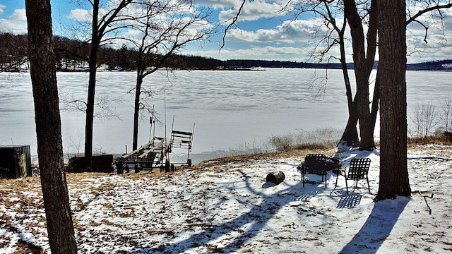 property view of water featuring a dock