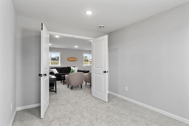 office area with light carpet, recessed lighting, and baseboards