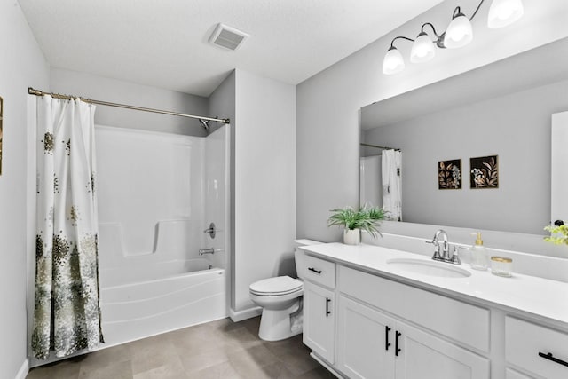 full bath with visible vents, shower / tub combo with curtain, vanity, and toilet