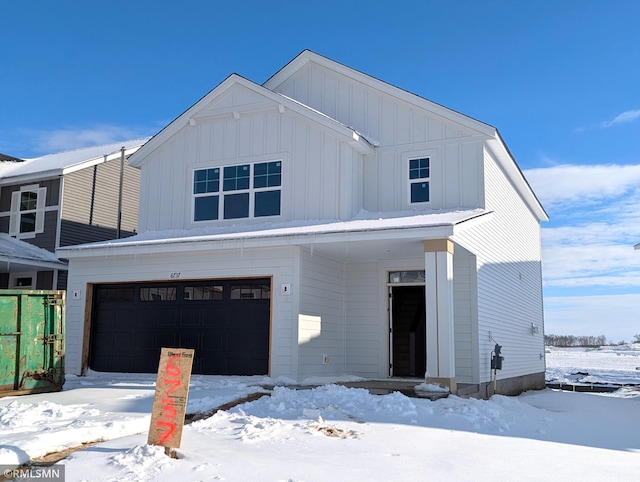 view of front of home featuring board and batten siding and a garage